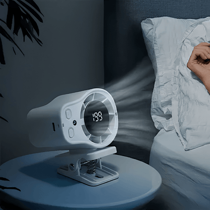Portable clip-on fan with adjustable airflow settings and LED display, perfect for desk use or travel, providing compact cooling solutions. 4