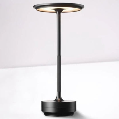 Portable cordless table lamp with adjustable brightness, featuring a sleek metallic finish, ideal for both indoor and outdoor use. 7