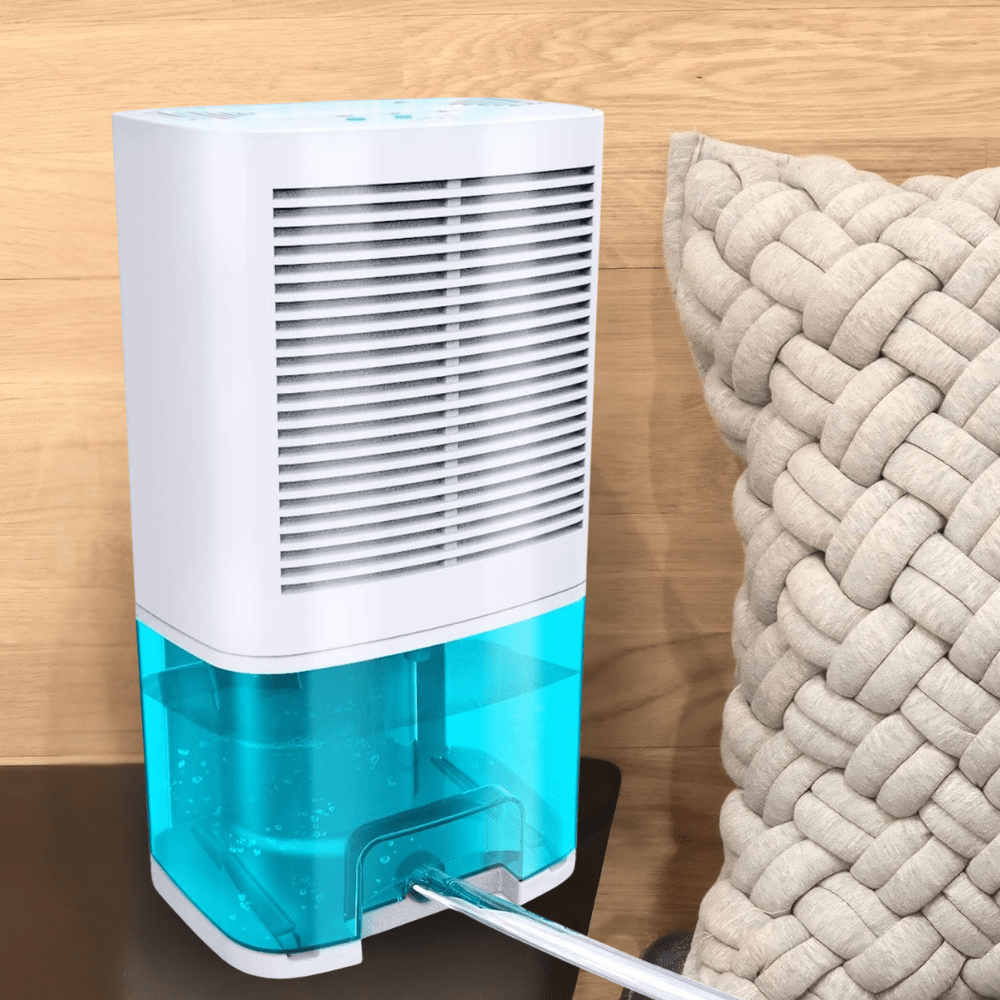 Portable dehumidifier designed for bathrooms and bedrooms featuring quiet operation, a large tank, and efficient moisture control. 0