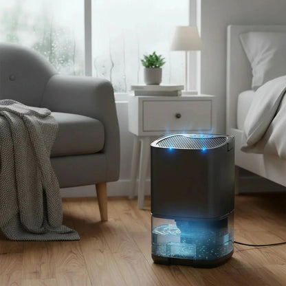 Portable dehumidifier designed for bathroom and home use, featuring a quiet operation and compact size for effective moisture control in small spaces. 0