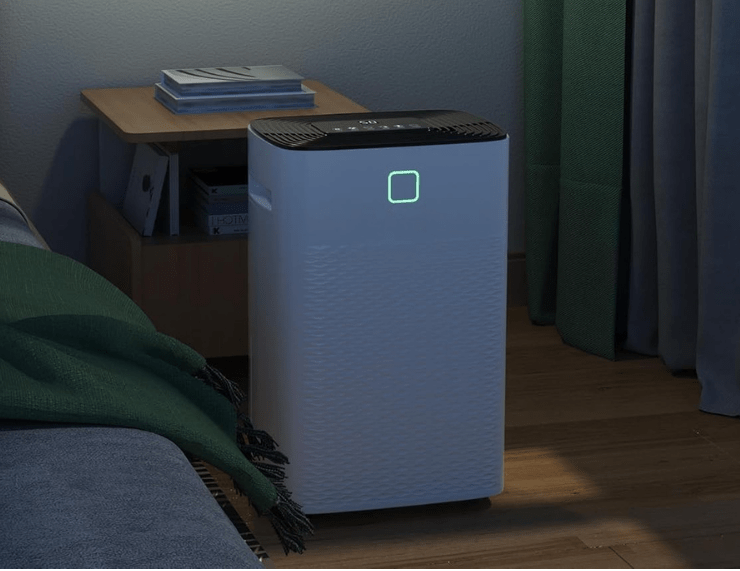 Portable dehumidifier for bedroom featuring smart humidity control, designed for quiet operation and capable of removing 30 pints of moisture daily. 3
