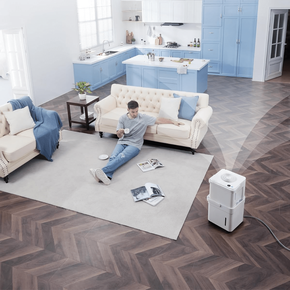Portable dehumidifier for home moisture control featuring a large tank and smart features, designed for compact use in bedrooms or bathrooms. 2