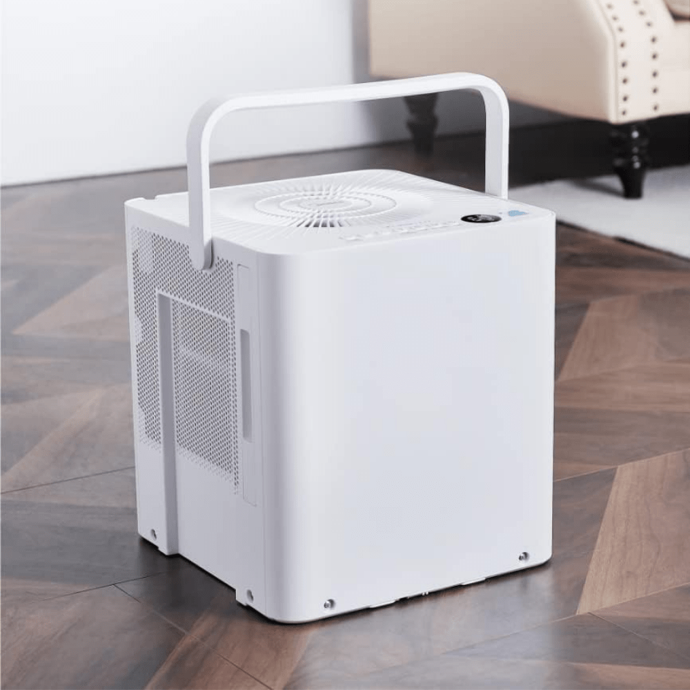 Portable dehumidifier for home moisture control featuring a large tank and smart features, designed for compact use in bedrooms or bathrooms. 1