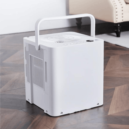 Portable dehumidifier for home moisture control featuring a large tank and smart features, designed for compact use in bedrooms or bathrooms. 1
