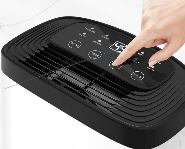 Portable dehumidifier designed for large rooms, featuring quiet operation and efficient moisture control, capable of removing 14.2 liters of humidity per day, 4