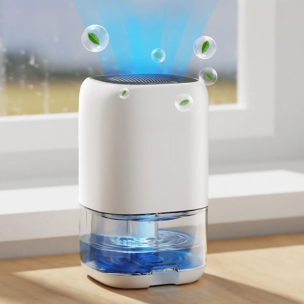 Portable dehumidifier designed for small rooms, featuring a 35oz tank, auto shut-off function, and quiet operation, ideal for bathrooms and bedrooms 0