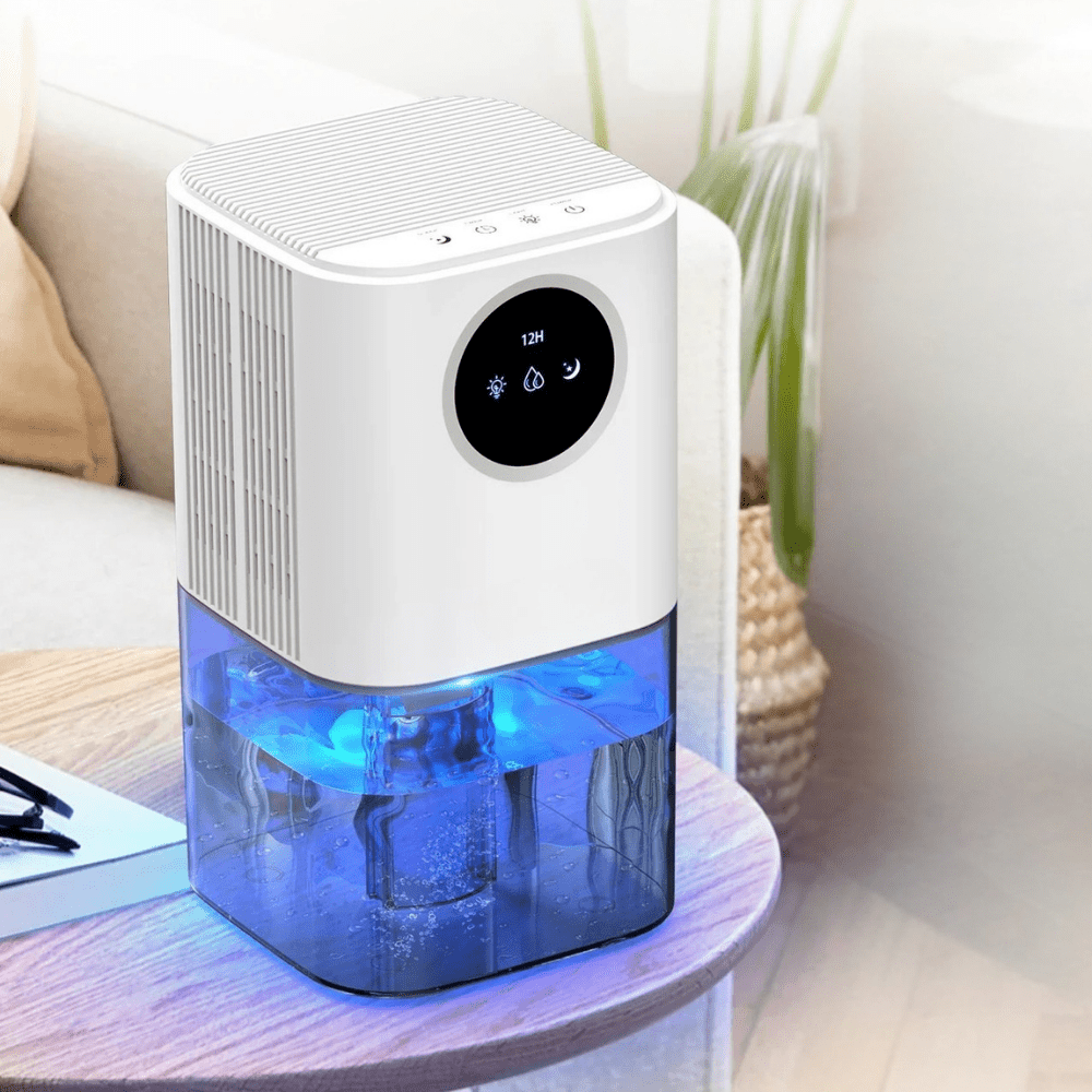 Portable dehumidifier designed for small spaces, featuring a timer and soothing night light, perfect for quiet operation in bedrooms and bathrooms. 3