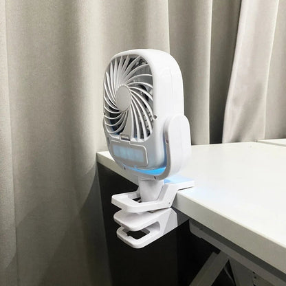 Portable evaporative cooler fan featuring a USB rechargeable battery and a foldable design for easy transport and storage, ideal for personal cooling in various settings. 3