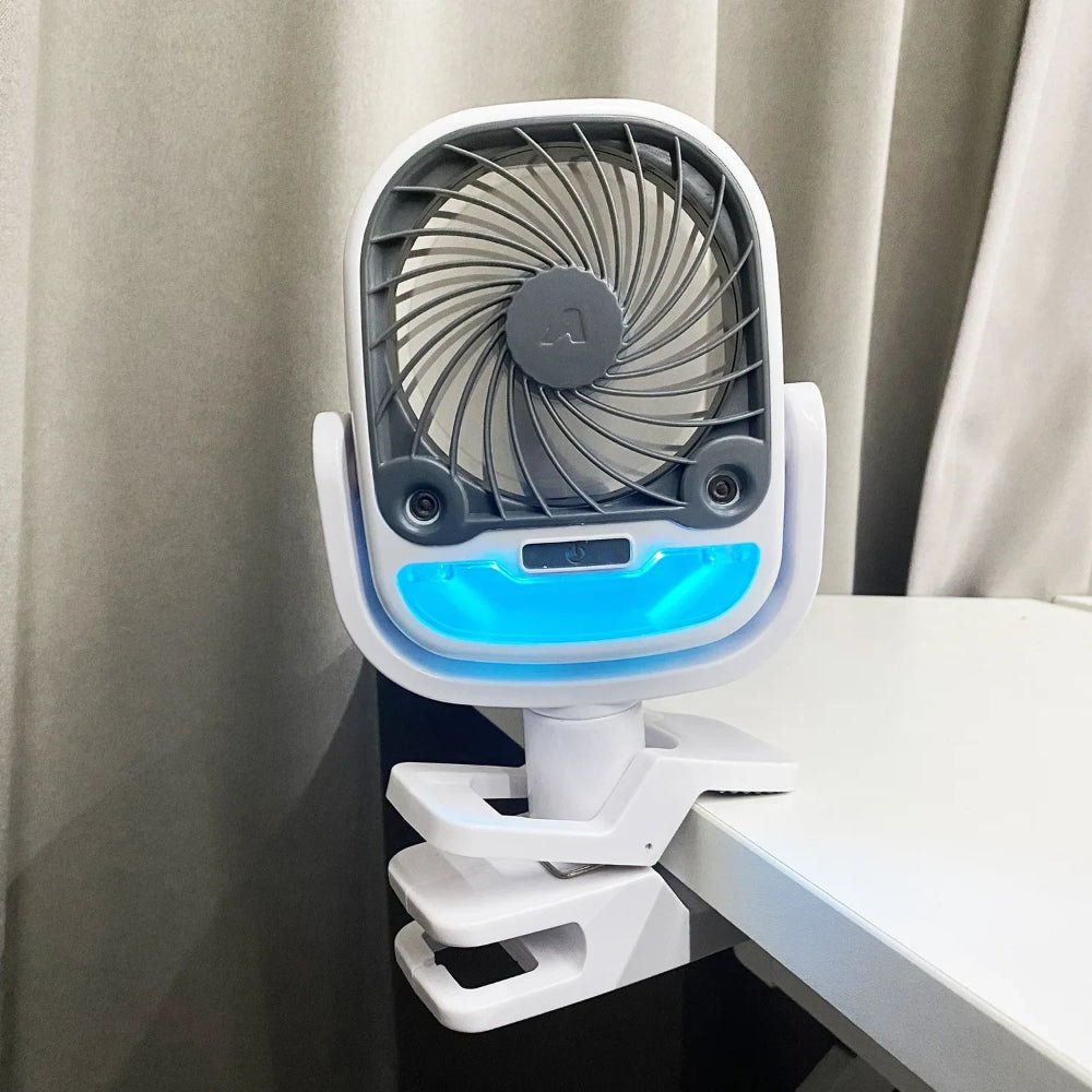 Portable evaporative cooler fan featuring a USB rechargeable battery and a foldable design for easy transport and storage, ideal for personal cooling in various settings. 1