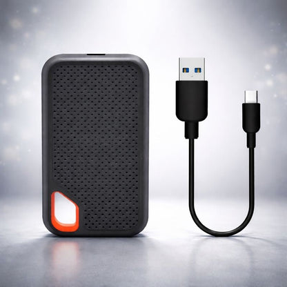 Portable external SSD drive featuring a sleek anodized aluminum design, USB-C connection for fast file transfer, compact size for easy portability, ideal for storing and 1