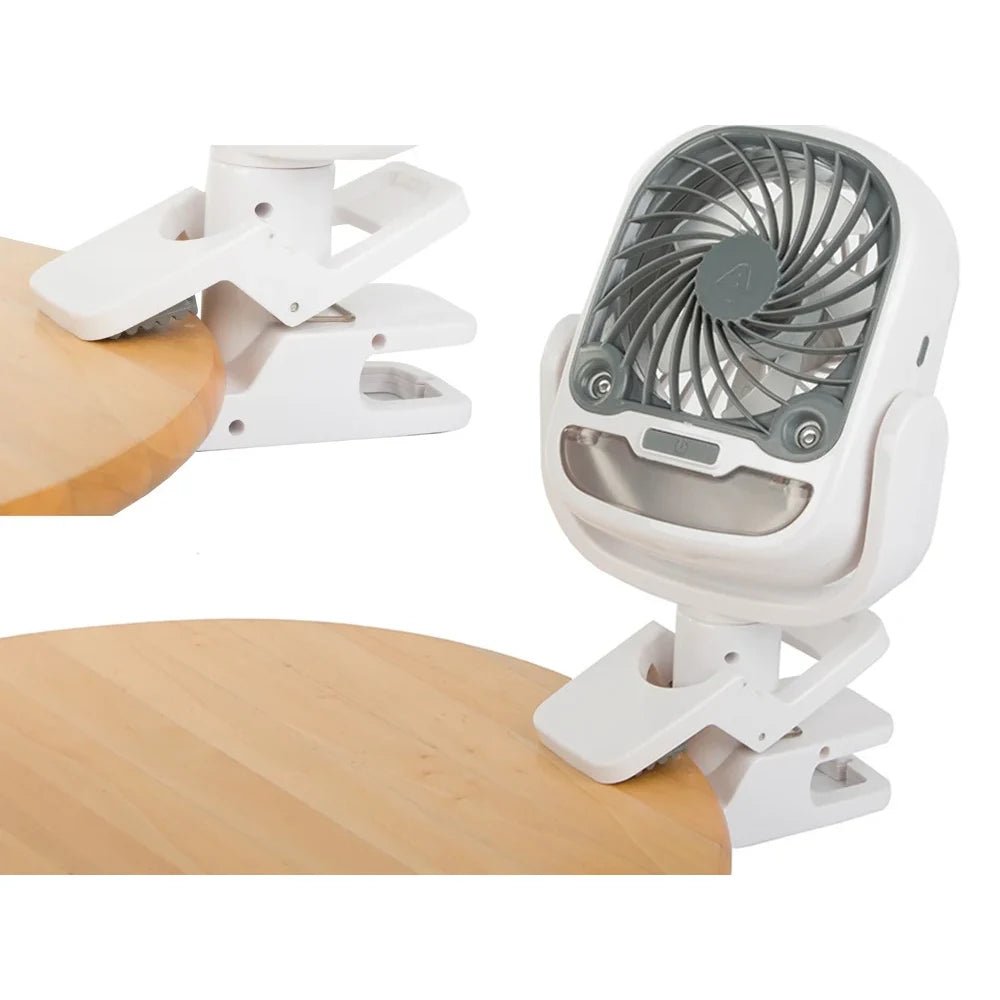 Portable fan with USB rechargeable battery and foldable design, perfect for travel and desk use, providing convenient cooling on-the-go. 0
