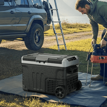 Portable fridge freezer featuring dual zone cooling, 53QT capacity, and rolling wheels, perfect for camping and travel, designed for 12V car use 1
