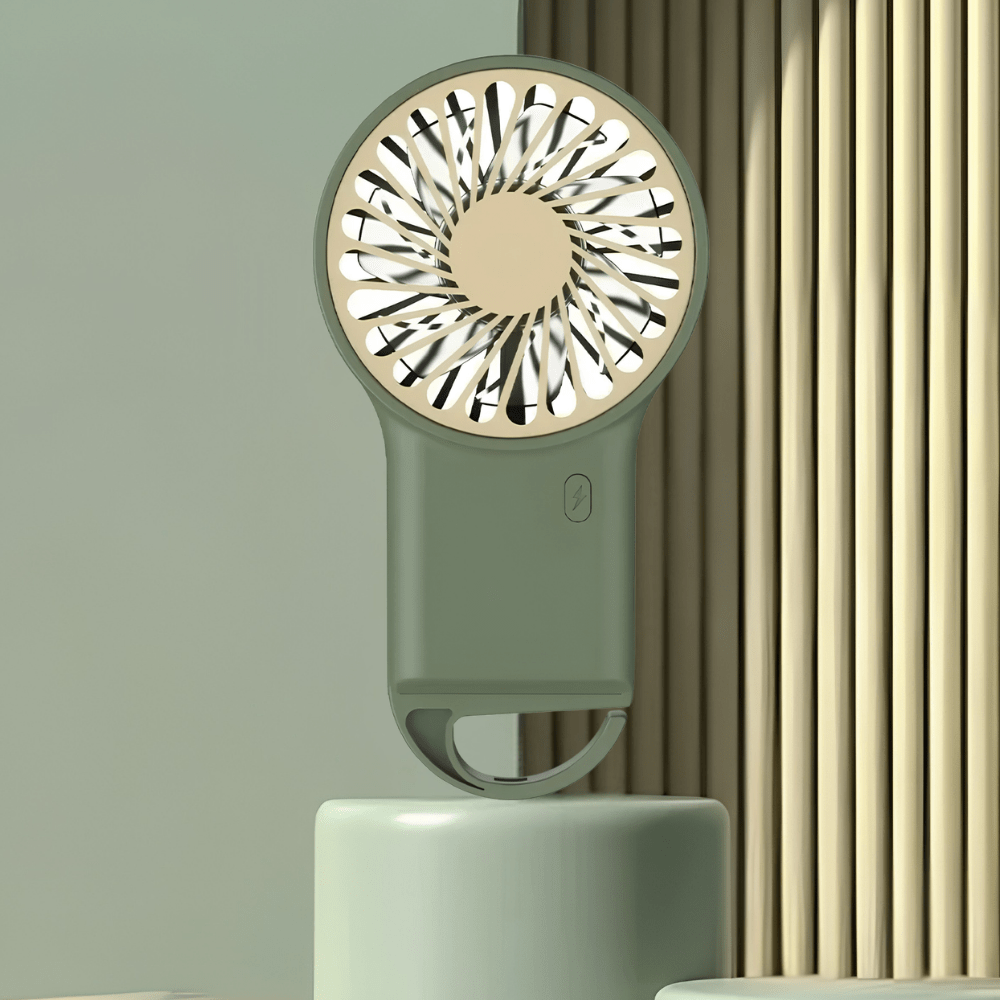 Portable handheld fan with USB rechargeable battery, featuring a foldable design for easy portability, perfect for on-the-go cooling solutions. 2