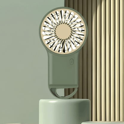 Portable handheld fan with USB rechargeable battery, featuring a foldable design for easy portability, perfect for on-the-go cooling solutions. 2