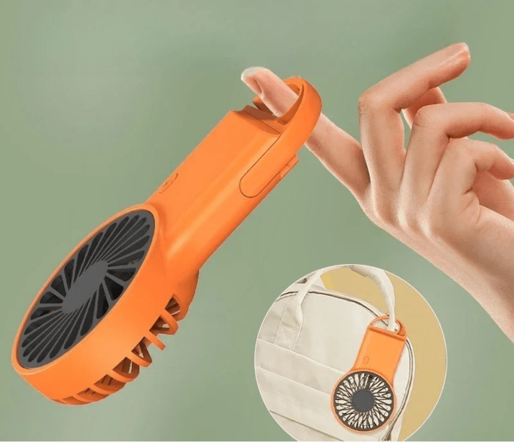 Portable handheld fan with USB rechargeable battery, featuring a foldable design for easy portability, perfect for on-the-go cooling solutions. 1