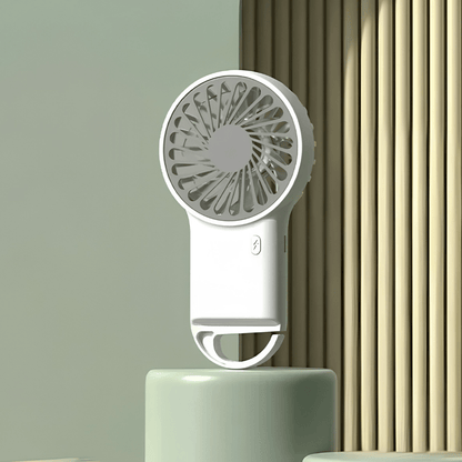 Portable handheld fan with USB rechargeable battery, featuring a foldable design for easy portability, perfect for on-the-go cooling solutions. 4