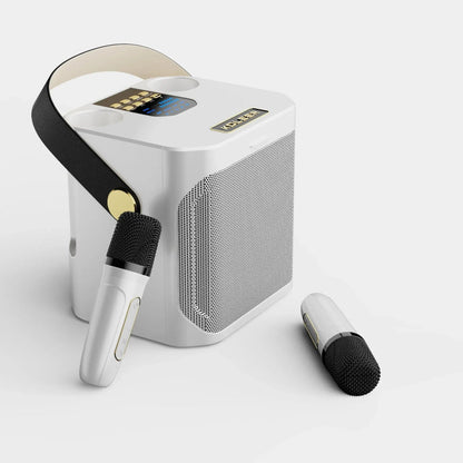 Portable karaoke speaker featuring dual wireless microphones and 360° surround sound, perfect for parties and gatherings, with Bluetooth connectivity for easy music streaming. 4