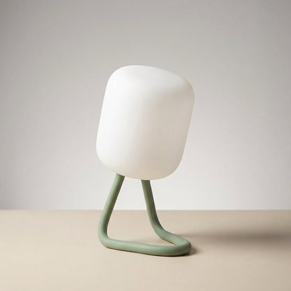 Portable LED night light featuring a soft ambient glow, available in green and blue, designed for battery-powered convenience and compact use. 2