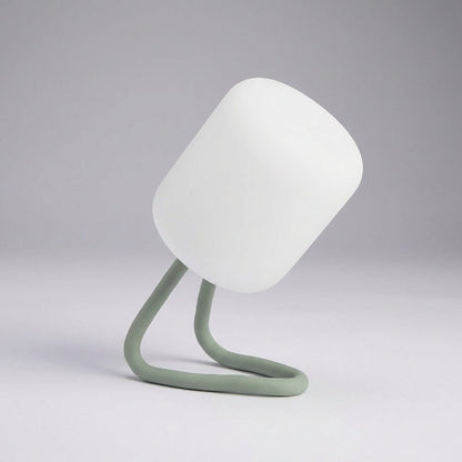 Portable LED night light featuring a soft ambient glow, available in green and blue, designed for battery-powered convenience and compact use. 0