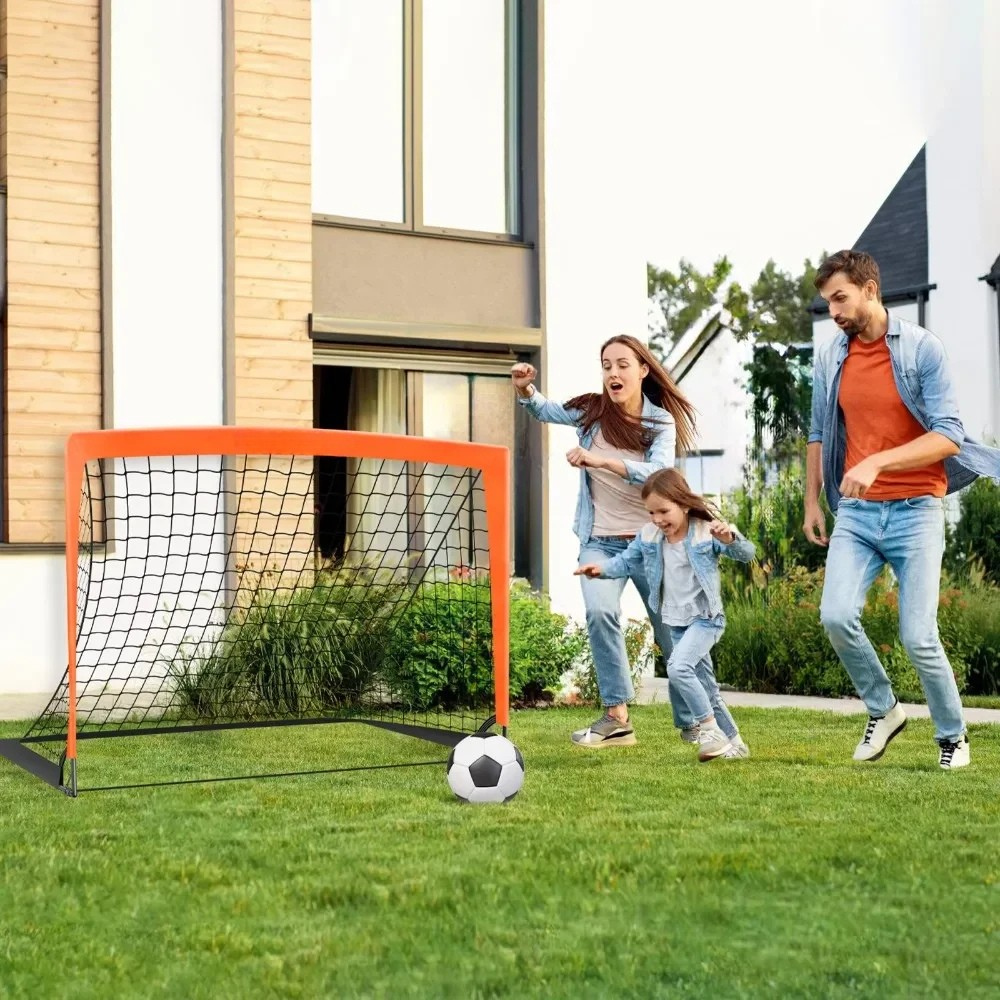 Portable soccer goal for kids featuring a reinforced steel frame and bright orange high-visibility design, perfect for outdoor training and practice sessions. 2