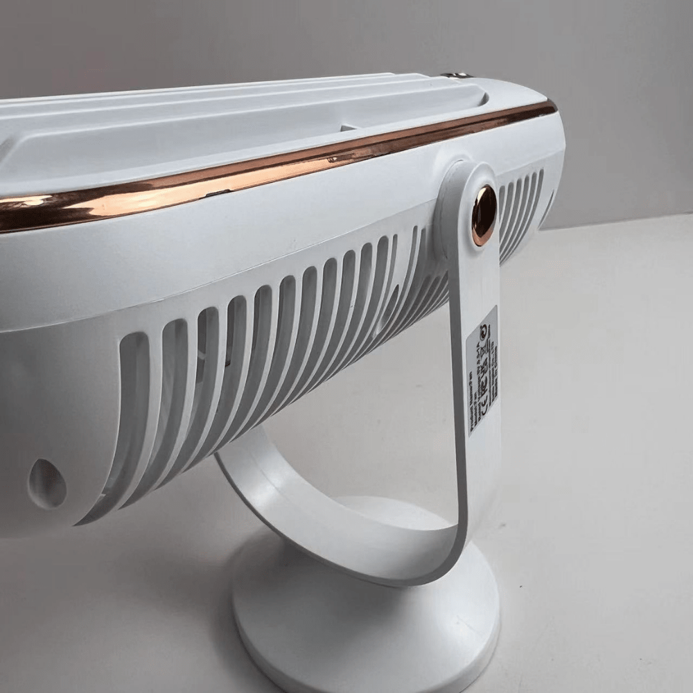 Portable tower fan with a rechargeable battery, designed for evaporative cooling and perfect for desktop use, featuring a sleek design and adjustable settings for personalized comfort. 3