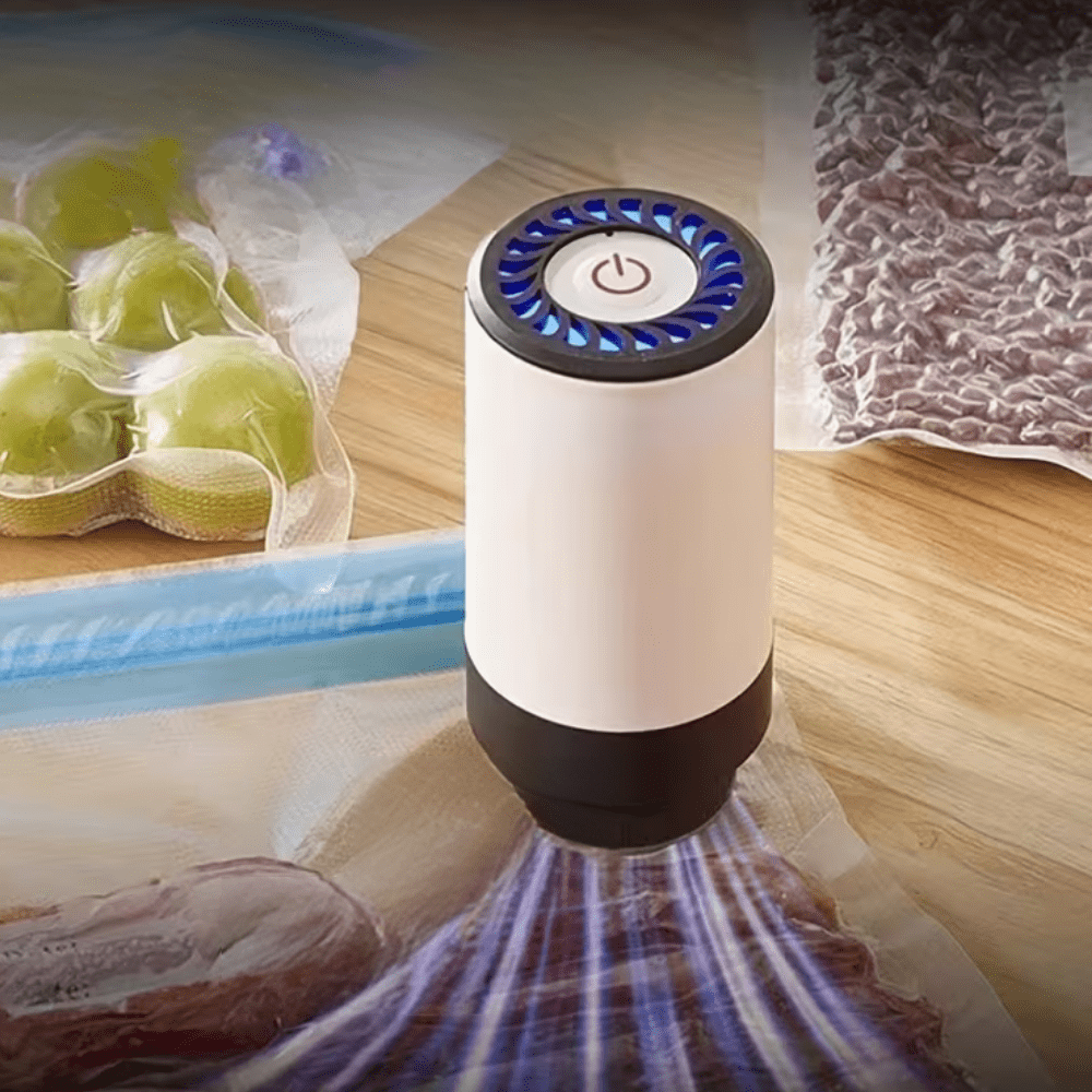 Portable vacuum sealer machine with dehumidifier function, designed for efficient moisture control and compact food storage, featuring easy-to-use controls and a sleek design 0