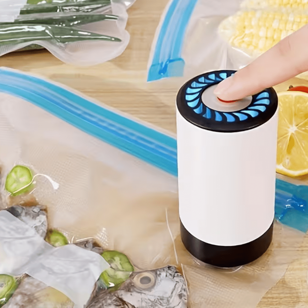 Portable vacuum sealer machine with dehumidifier function, designed for efficient moisture control and compact food storage, featuring easy-to-use controls and a sleek design 3