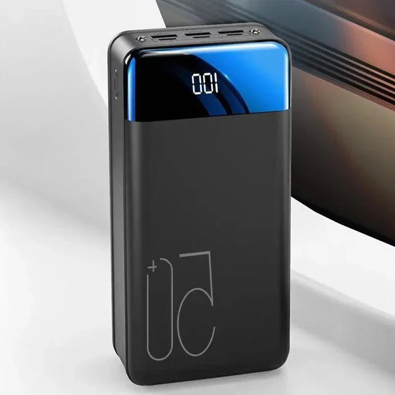 Power Bank 50,000mAh with Fast Charging, portable charger for phones, tablets, and laptops, featuring a sleek design and multiple USB ports 1