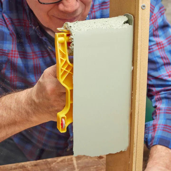 Precision painting roller designed for corners and edges, featuring an ergonomic handle for comfort and easy cleaning, made from durable PVC and cotton materials. 5