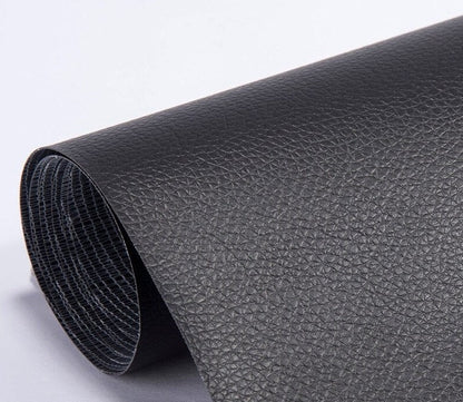 PU leather repair patch in black, showcasing its waterproof and self-adhesive features, ideal for seamless restoration of furniture and upholstery. 0