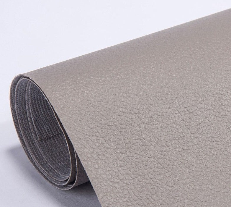 PU leather repair patch in black, showcasing its waterproof and self-adhesive features, ideal for seamless restoration of furniture and upholstery. 19