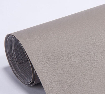 PU leather repair patch in black, showcasing its waterproof and self-adhesive features, ideal for seamless restoration of furniture and upholstery. 19