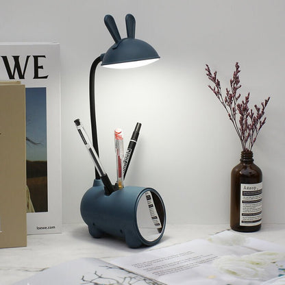 Rabbit LED desk lamp with touch control, featuring a cute design, built-in pen organizer, and USB charging port, perfect for kids' study spaces. 7