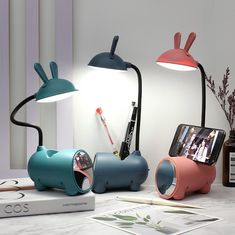 Rabbit LED desk lamp with touch control, featuring a cute design, built-in pen organizer, and USB charging port, perfect for kids' study spaces. 0