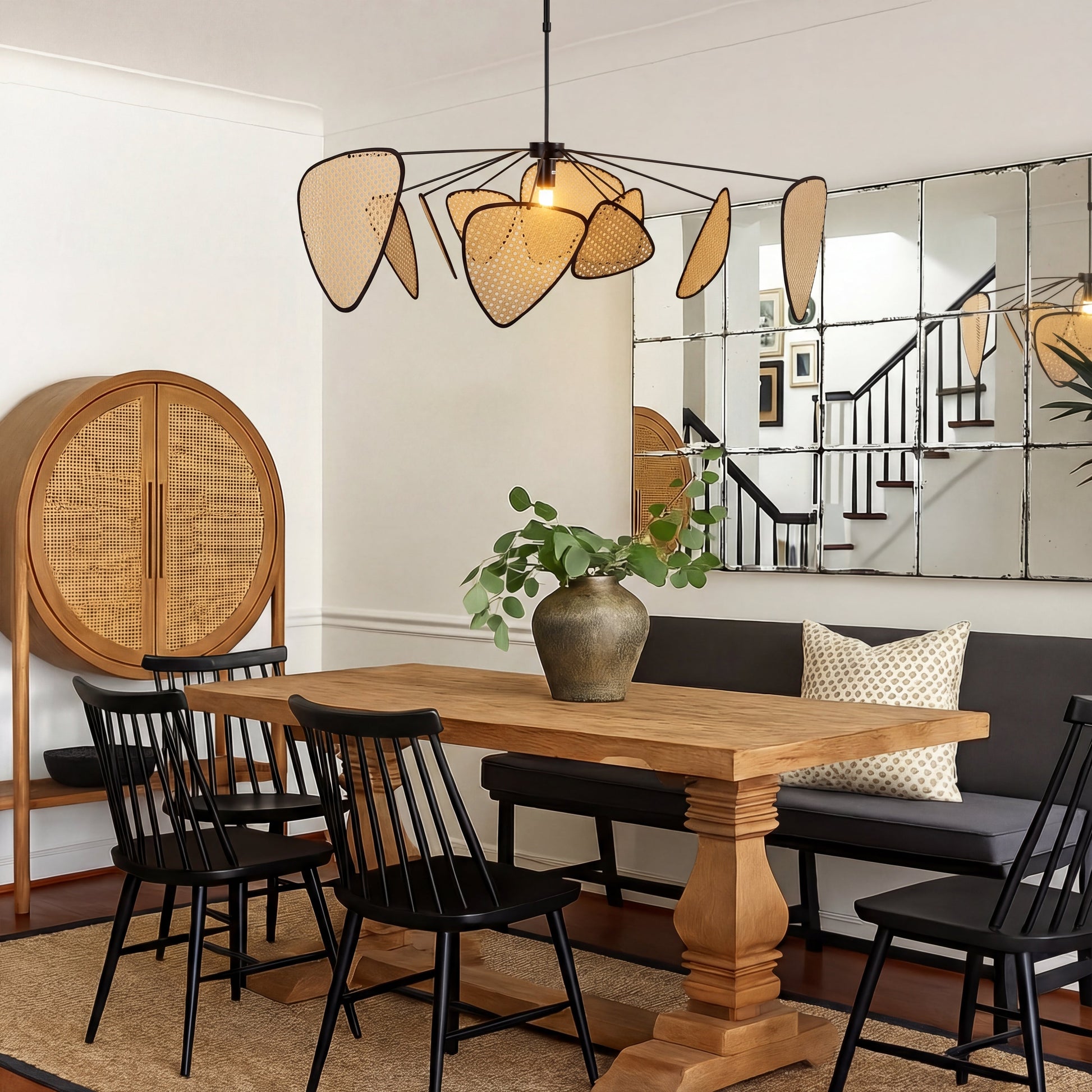 Rattan pendant light with adjustable cable featuring an organic modern design, perfect for enhancing kitchen and dining spaces. 1