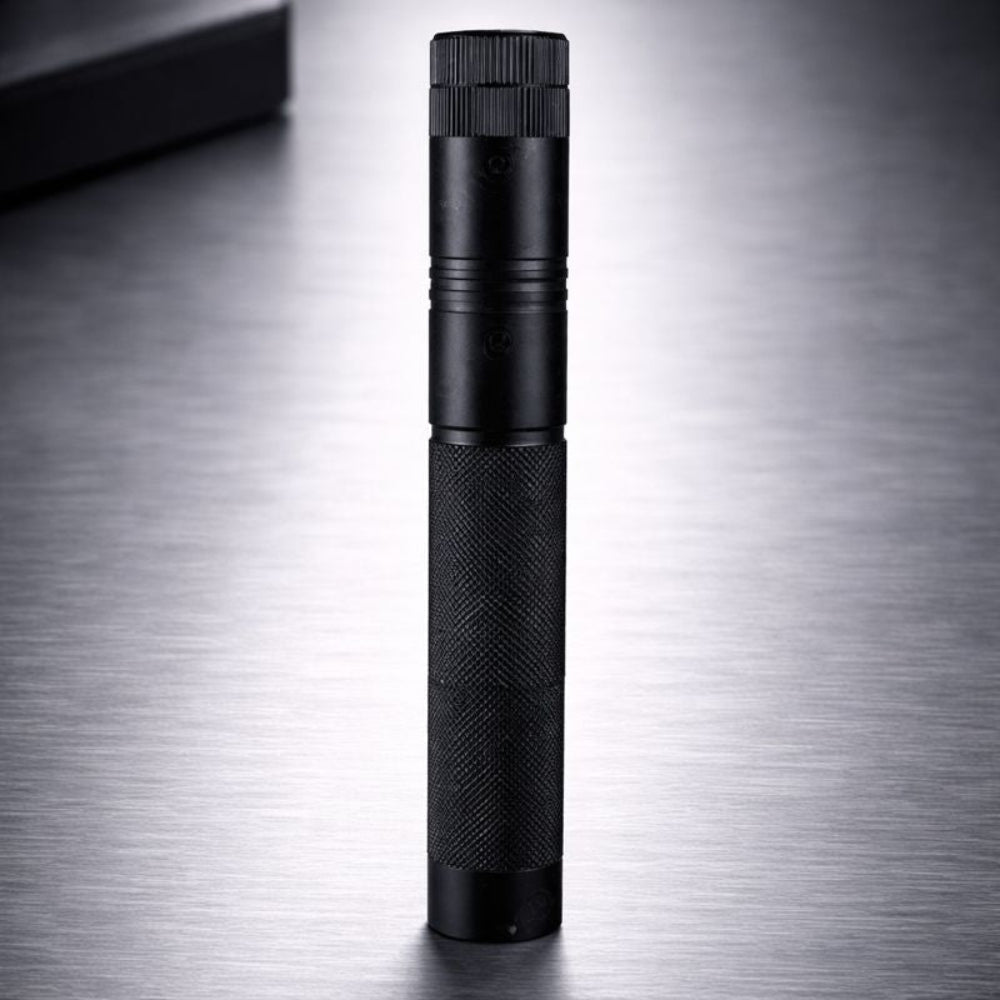 Rechargeable laser pointer featuring adjustable focus and a safety lock, designed for long-range use, with USB charging capability. 2