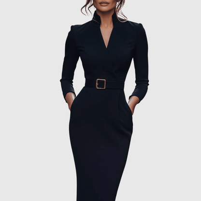 Refined midi dress featuring a mock wrap neckline and a belted waist, perfect for elegant occasions and versatile styling. 1