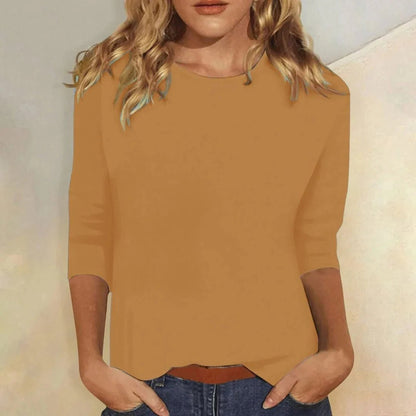 Relaxed 3/4 sleeve top with crew neck, perfect for versatile everyday wear, featuring a comfortable fit and stylish design. 8
