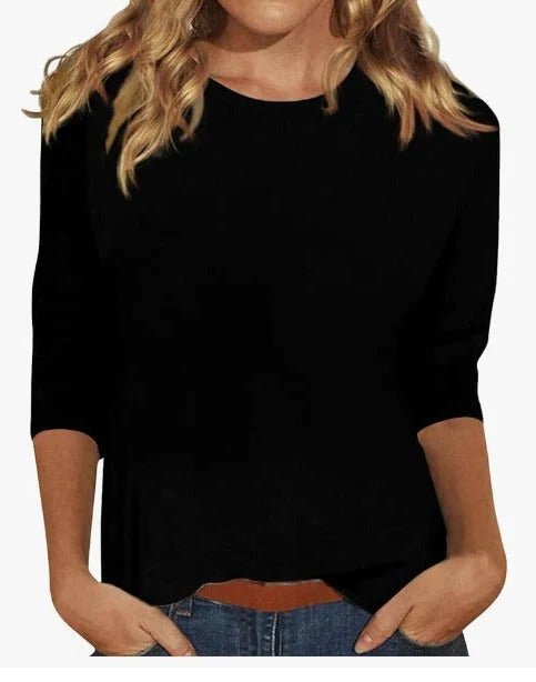 Relaxed 3/4 sleeve top with crew neck, perfect for versatile everyday wear, featuring a comfortable fit and stylish design. 4