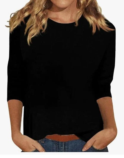 Relaxed 3/4 sleeve top with crew neck, perfect for versatile everyday wear, featuring a comfortable fit and stylish design. 4