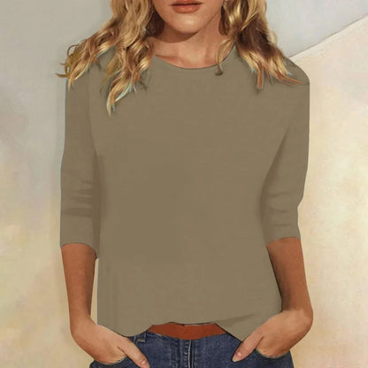Relaxed 3/4 sleeve top with crew neck, perfect for versatile everyday wear, featuring a comfortable fit and stylish design. 6