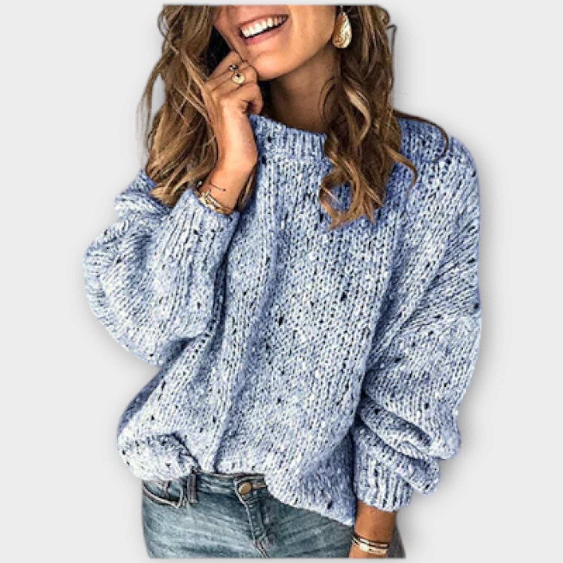 Retro knit sweater featuring a cozy texture, soft relaxed fit, and vintage-inspired design, perfect for stylish layering in colder weather. 1