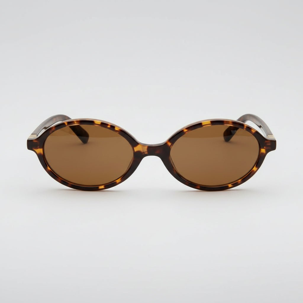 Retro oval sunglasses featuring UV400 protection, designed with a lightweight small frame for women, perfect for stylish sun protection. 4