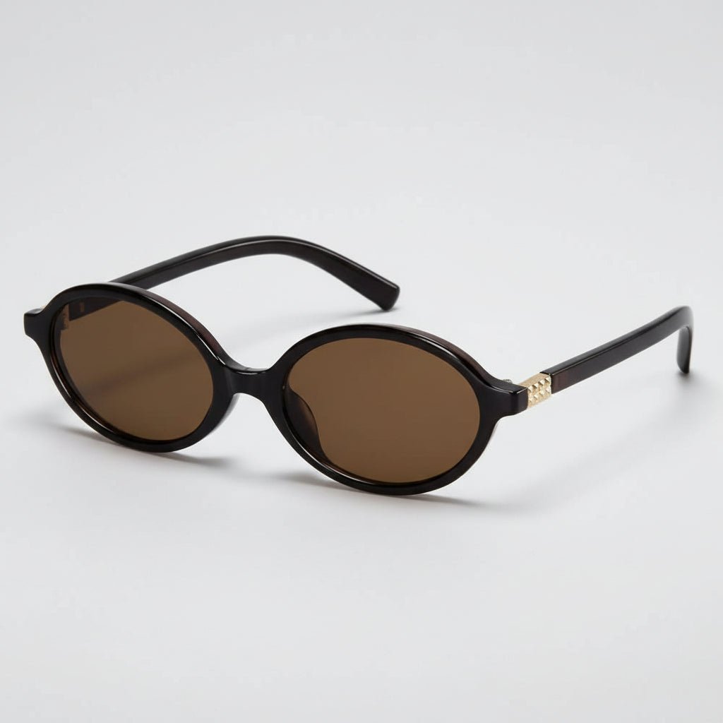 Retro oval sunglasses featuring UV400 protection, designed with a lightweight small frame for women, perfect for stylish sun protection. 6
