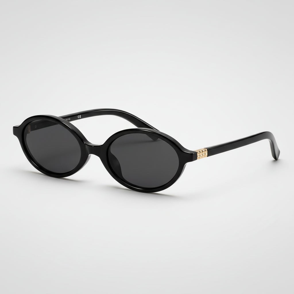 Retro oval sunglasses featuring UV400 protection, designed with a lightweight small frame for women, perfect for stylish sun protection. 0