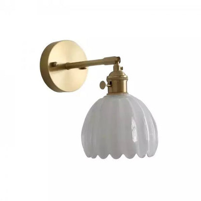 Retro wall lamp featuring a tulip glass shade, designed as a metal wall sconce to enhance cozy atmospheres in living spaces. 11