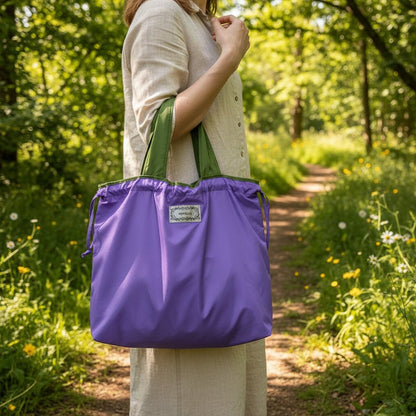 Reusable tote bag with a rectangle design and wristlet strap, perfect for shopping and everyday use, featuring durable materials and stylish aesthetics. 0