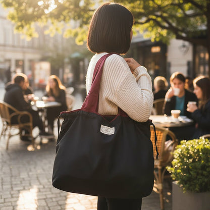 Reusable tote bag with a rectangle design and wristlet strap, perfect for shopping and everyday use, featuring durable materials and stylish aesthetics. 15