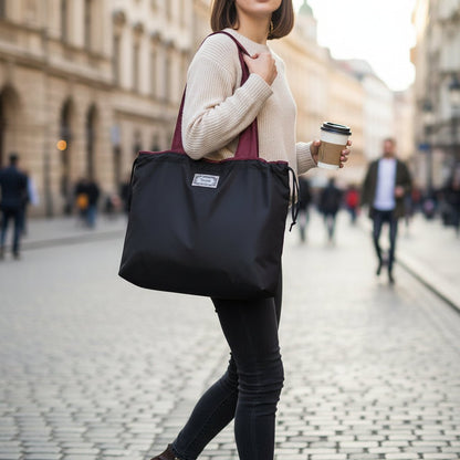Reusable tote bag with a rectangle design and wristlet strap, perfect for shopping and everyday use, featuring durable materials and stylish aesthetics. 17