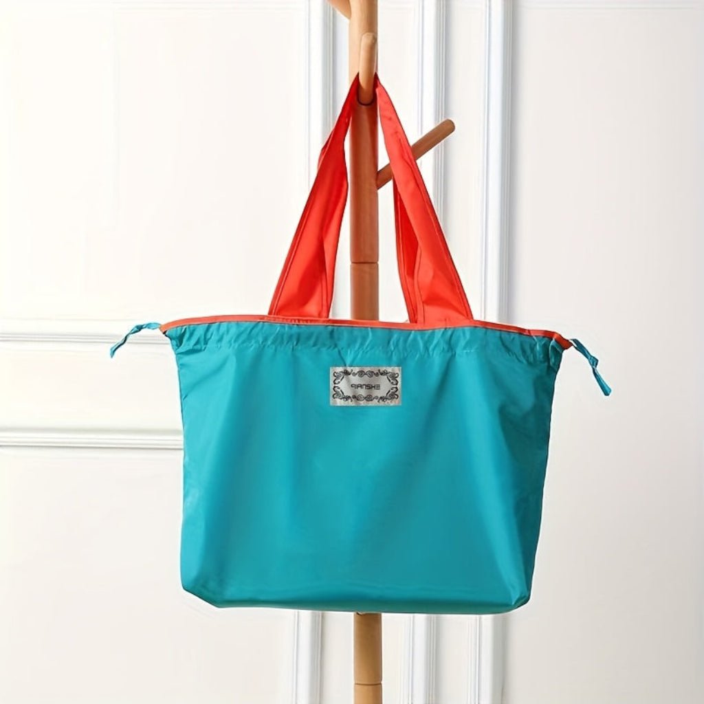 Reusable tote bag with a rectangle design and wristlet strap, perfect for shopping and everyday use, featuring durable materials and stylish aesthetics. 7